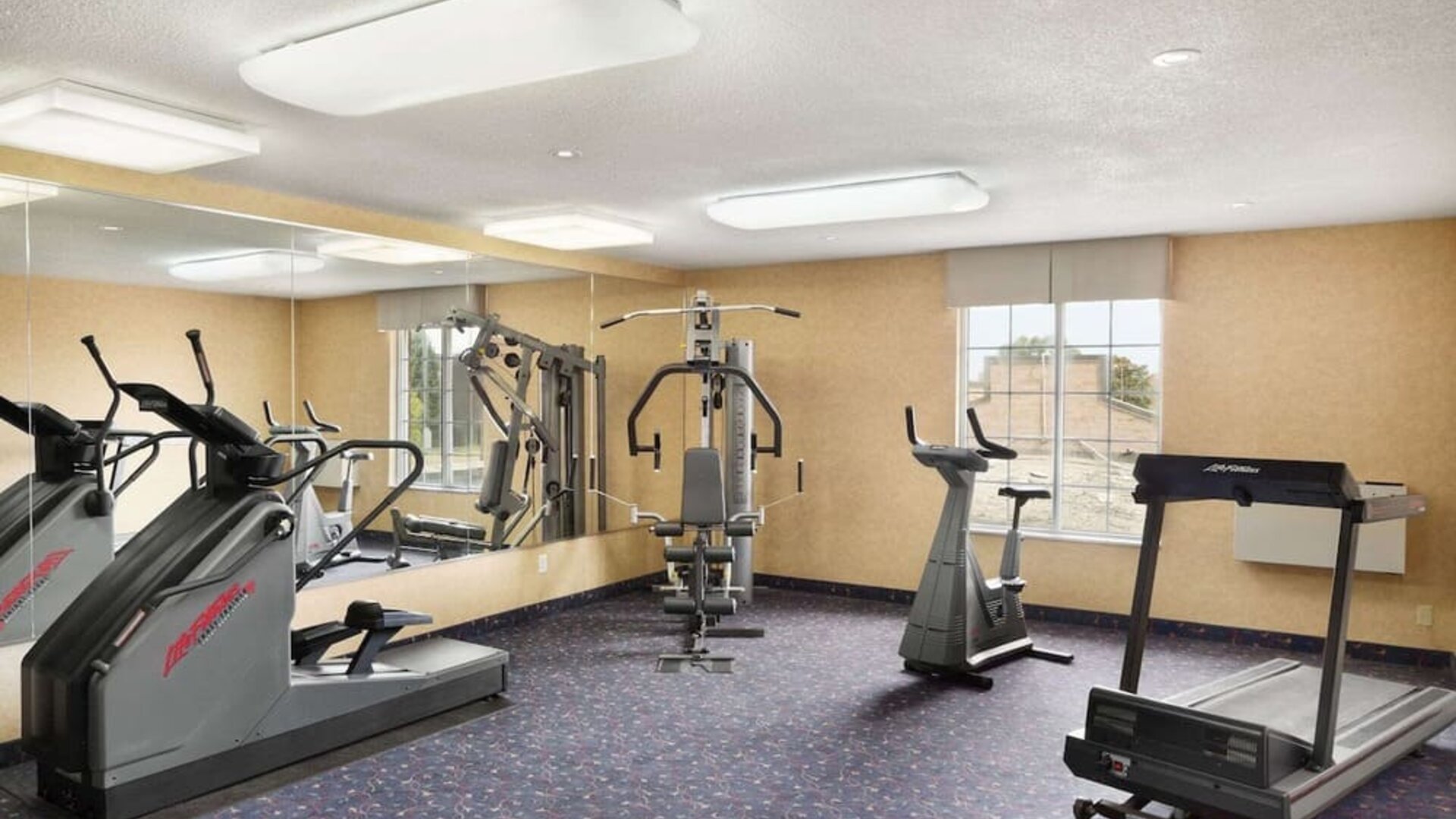 Fitness center at Days Inn By Wyndham Brantford.