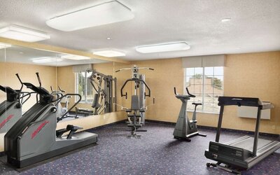 Fitness center at Days Inn By Wyndham Brantford.