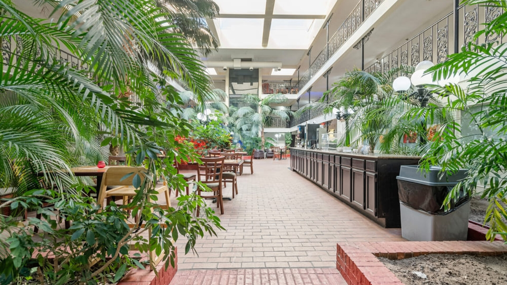 Dining area at Coratel Plus Suites Wichita West Airport.