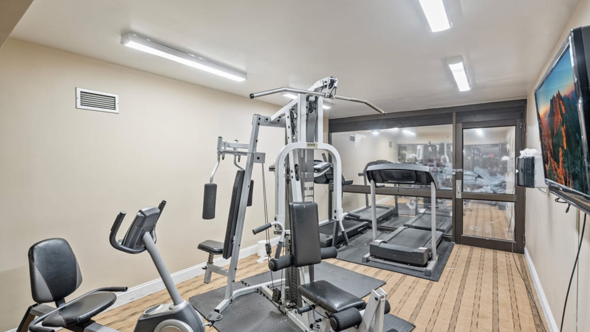 Fitness center at Coratel Plus Suites Wichita West Airport.