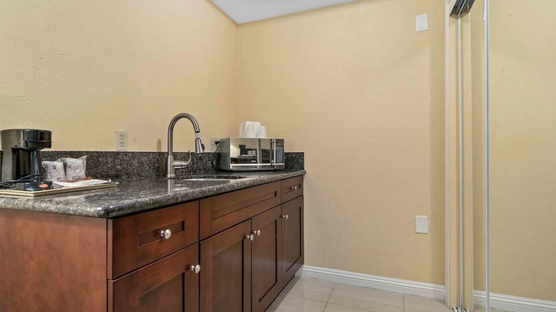 Kitchen area at Lemon Tree Hotel & Suites Anaheim.