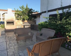 Outdoor terrace at Lemon Tree Hotel & Suites Anaheim.