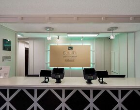 Reception hall at Quality Inn & Suites Irving DFW Airport South.