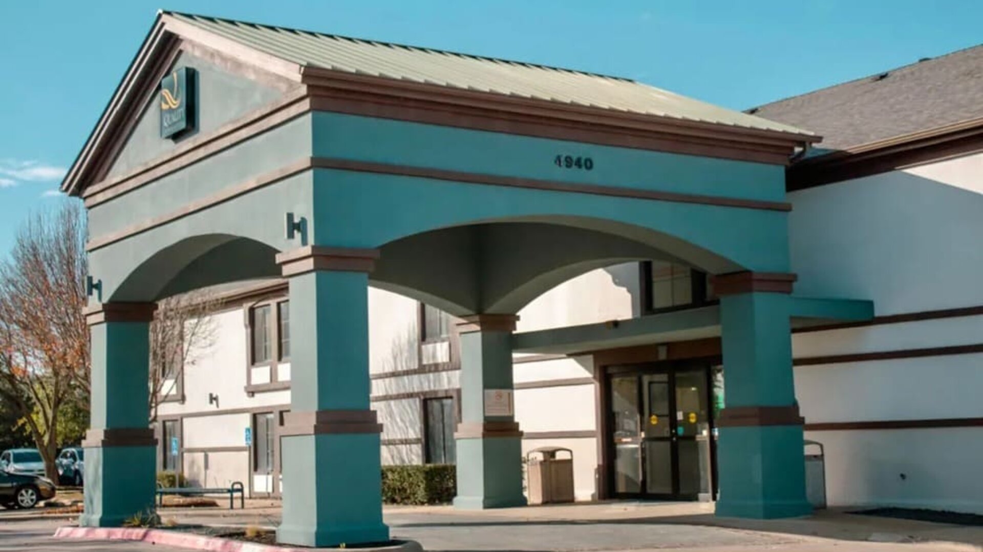 Hotel exterior at Quality Inn & Suites Irving DFW Airport South.