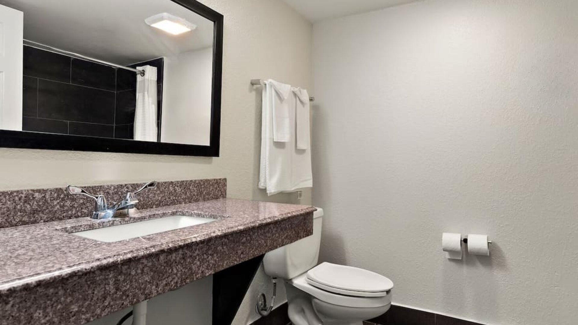 Guest bathroom at Quality Inn Memphis Northeast Near I-40.