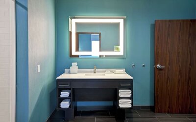 Guest bathroom at Home2 Suites El Reno.