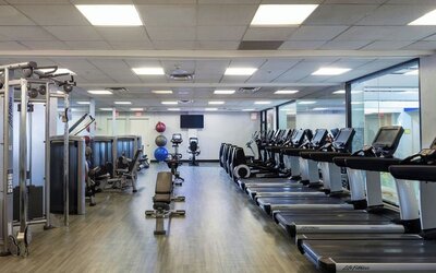 Fully-equipped fitness center at Boston Marriott Newton.