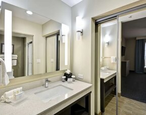 Guest bathroom at Homewood Suites By Hilton Orlando Theme Parks.