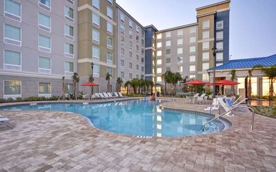 Outdoor pool at Homewood Suites By Hilton Orlando Theme Parks.