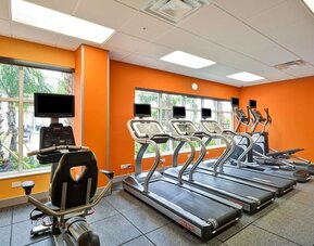 Gym at Homewood Suites By Hilton Orlando Theme Parks.