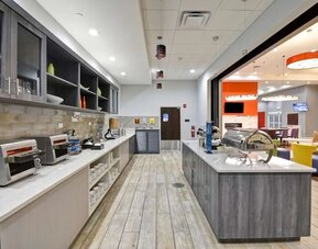 Breakfast available at Homewood Suites By Hilton Orlando Theme Parks.