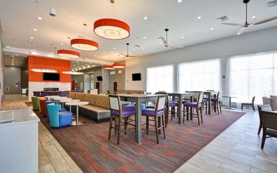 Dining room at Homewood Suites By Hilton Orlando Theme Parks.