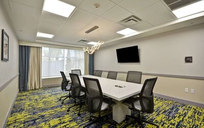 Meeting room at Homewood Suites By Hilton Orlando Theme Parks.