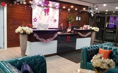 Reception desk at Baymont By Wyndham Montreal Airport.