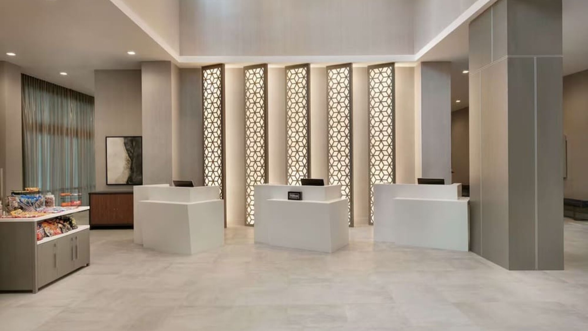 Reception desk at Embassy Suites By Hilton Atlanta Midtown.