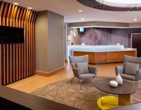 Lobby seating at Sonesta Select Nashville Airport Suites.