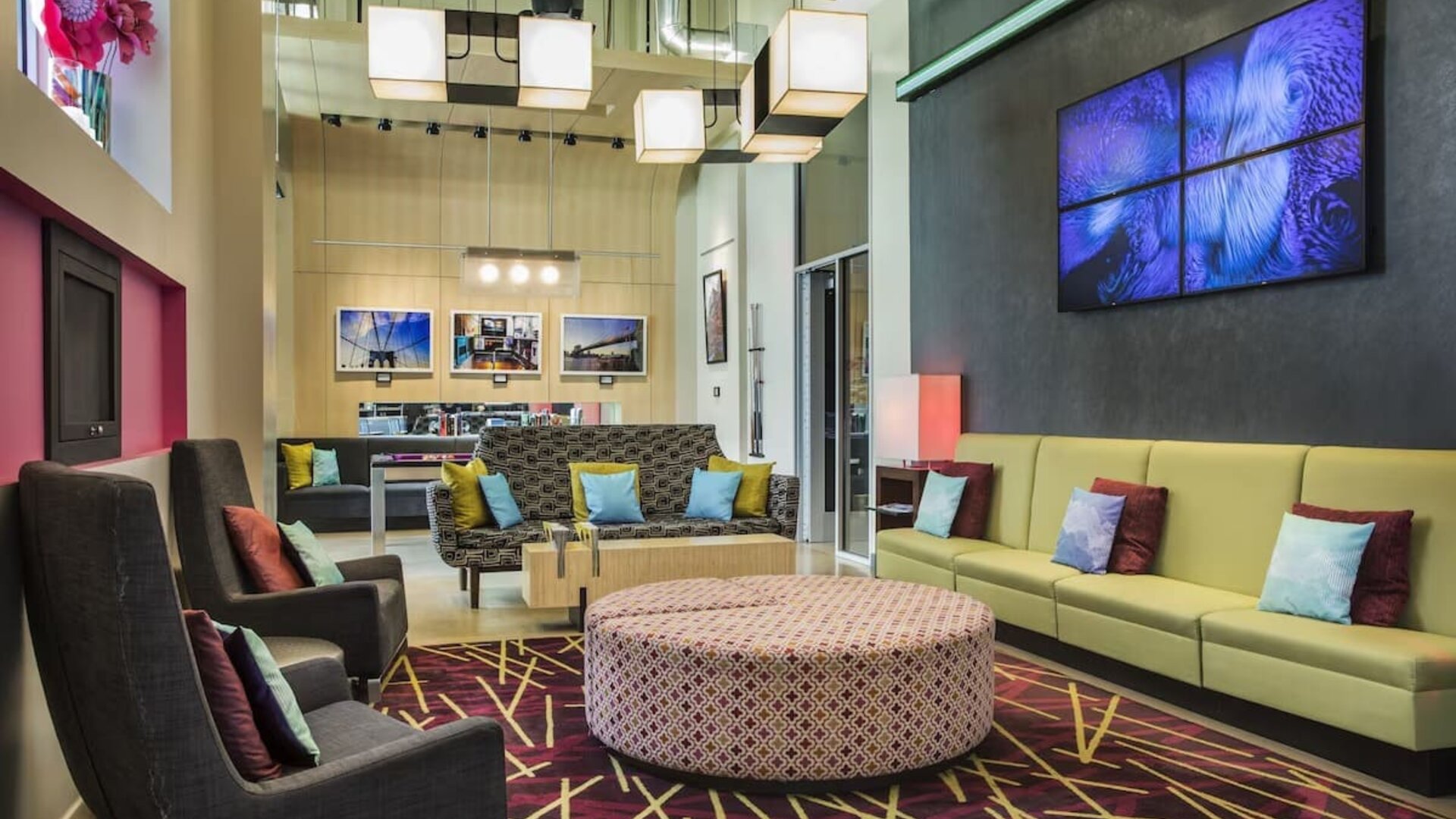 Lounge with comfortable chairs perfect for coworking at Aloft Manhattan Downtown - Financial District.