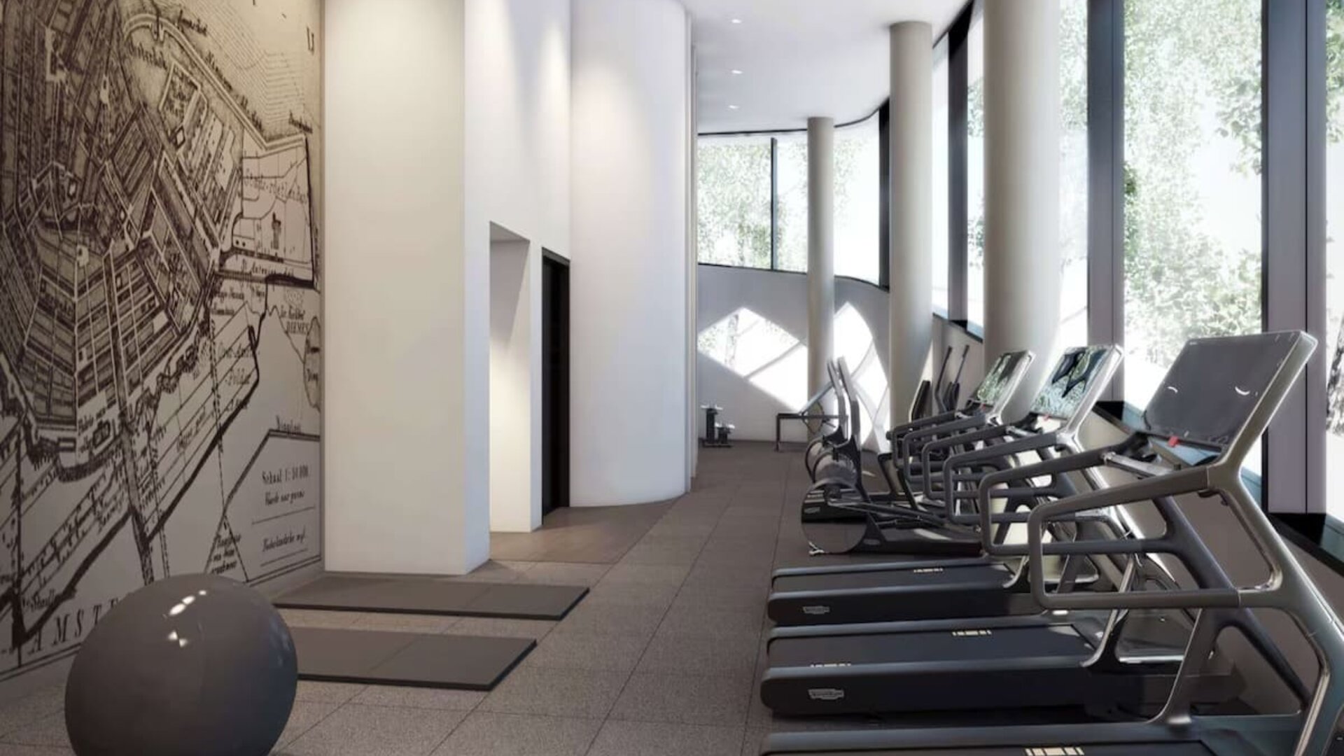 Fitness center with natural light at Hilton Amsterdam Airport Schiphol.