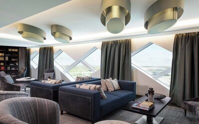 Coworking space with natural light at Hilton Amsterdam Airport Schiphol.