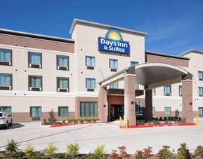 Hotel exterior at Days Inn & Suites By Wyndham Houston NW Cypress.