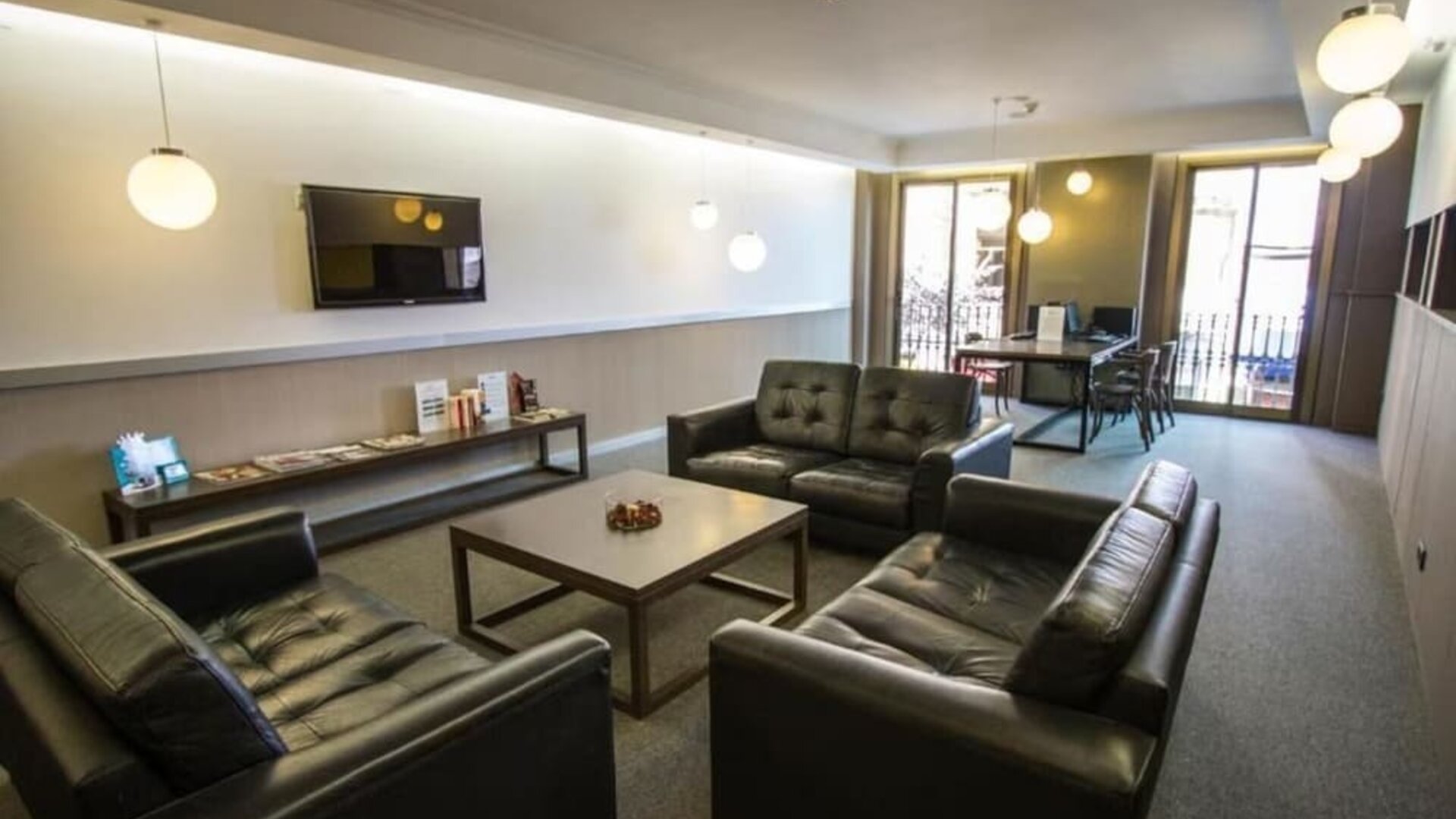 Lobby seating at Hotel Moderno Barcelona.