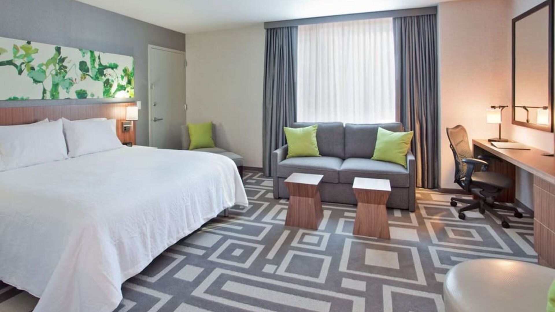 Day use room with work desk and natural light at Hilton Garden Inn New York Central Park South Mid-town West.