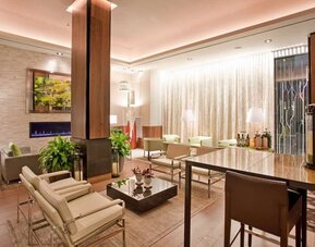 Lobby and coworking lounge at Hilton Garden Inn New York Central Park South Mid-town West.