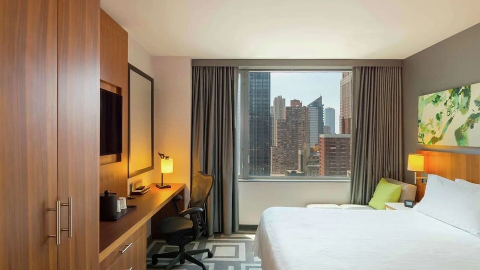 Day use room with work desk and natural light at Hilton Garden Inn New York Central Park South Mid-town West.