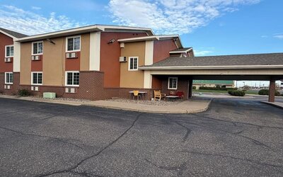 Hotel exterior at Coratel Inn And Suites By Jasper Stillwater.