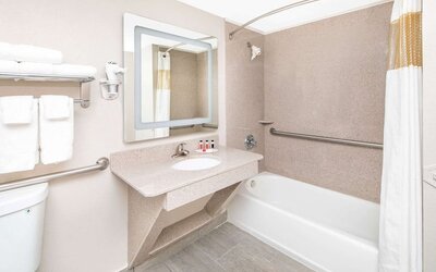 Guest bathroom at Ramada By Wyndham Alpharetta/Atlanta North.