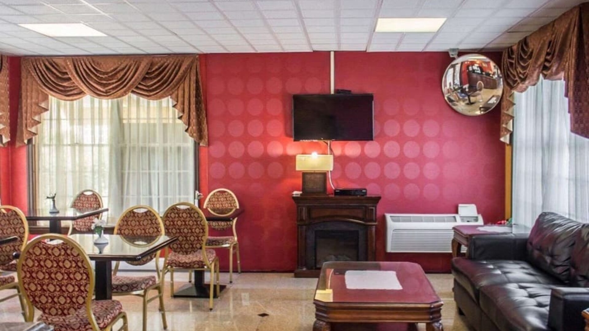 Lobby and coworking lounge at Rodeway Inn Huntington Station.