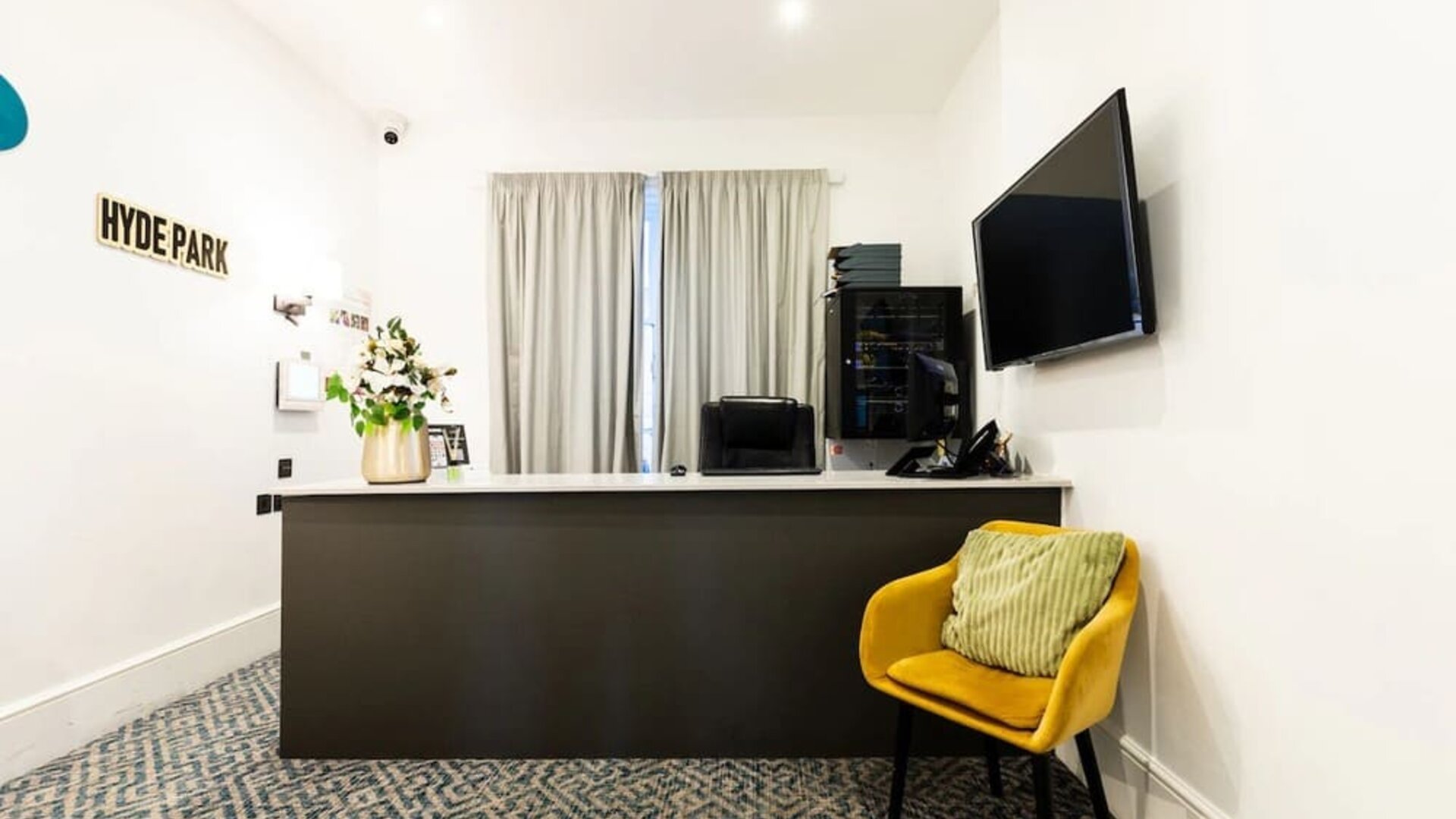 Front desk at The Chapter Hotels - J Hyde Park.