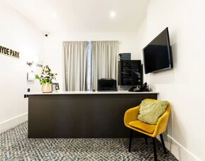 Front desk at The Chapter Hotels - J Hyde Park.