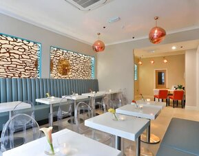 Dining area at The Chapter Hotels - London Hyde Park.