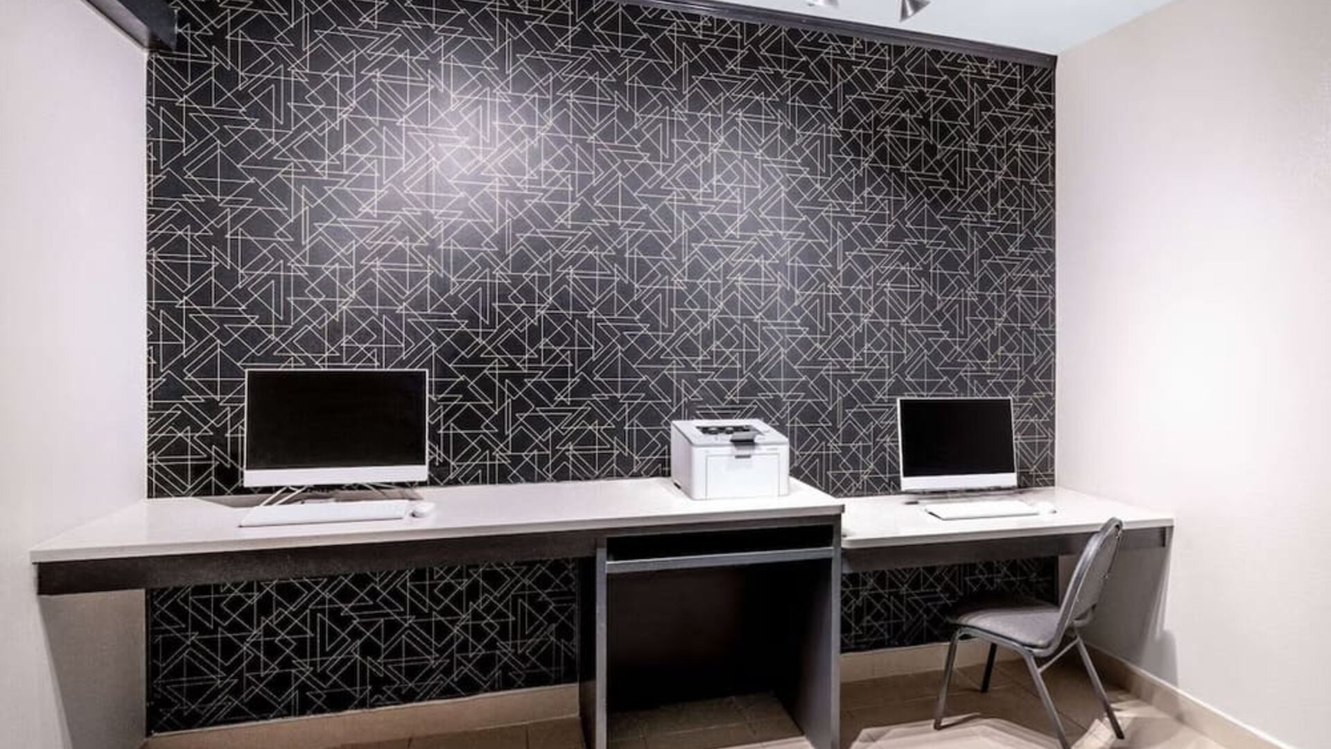 Business center at La Quinta Inn & Suites By Wyndham Roswell.