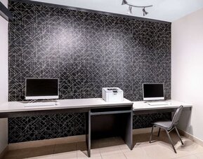 Business center at La Quinta Inn & Suites By Wyndham Roswell.