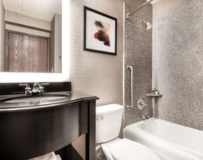 Guest bathroom at Crowne Plaza Milwaukee Airport By IHG.