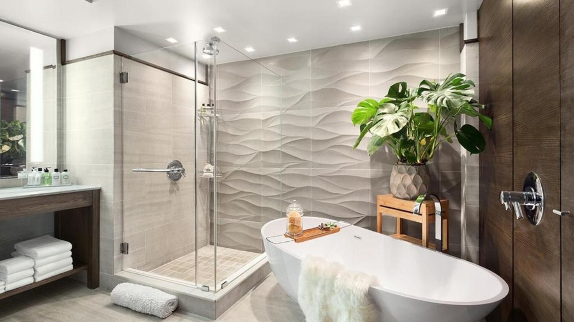 Private guest bathroom with combined shower and tub at Hotel 48LEX New York.
