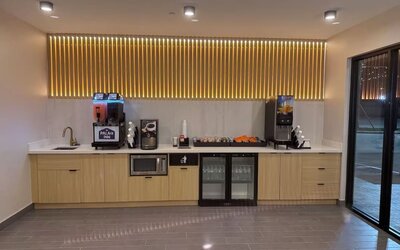 Coffee station at Palace Inn Blue 290 W 43rd & Bingle Rd.