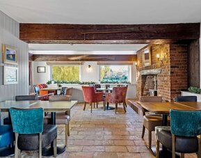 Dining area at The Mill Hotel - Surya Hotels
