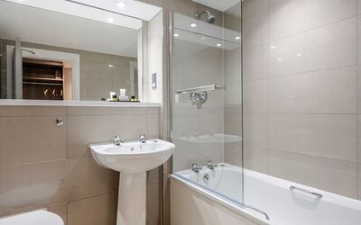 Bathroom at Hog's Back Hotel and Spa - Surya Hotels.
