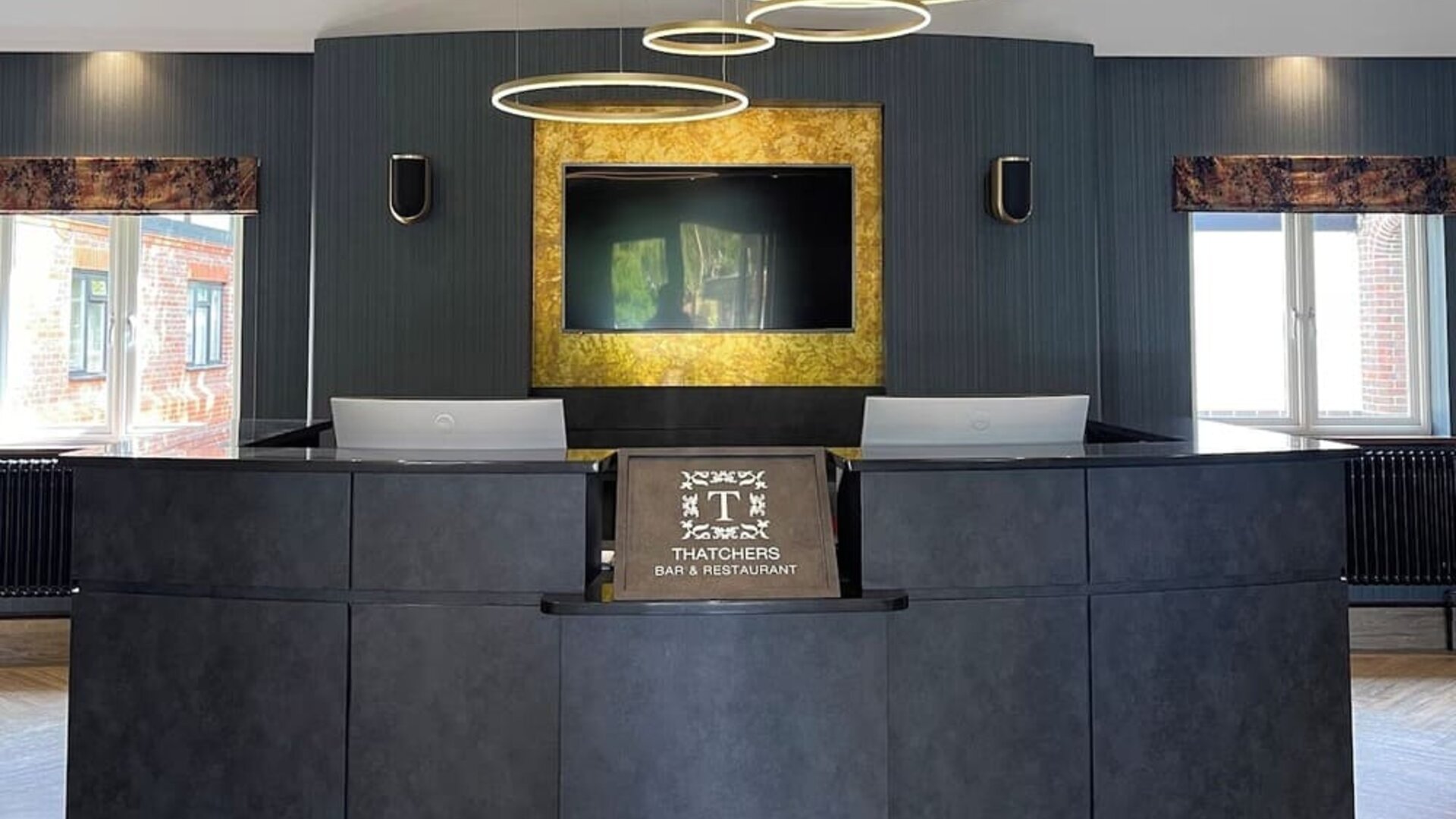 Reception at Thatcher's Hotel - Surya Hotels.