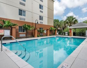 Outdoor pool at Candlewood Suites Fort Myers/Sanibel Island.