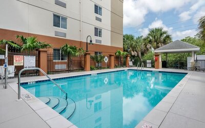 Outdoor pool at Candlewood Suites Fort Myers/Sanibel Island.