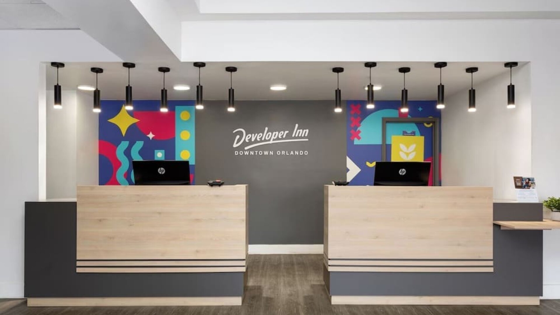 Reception desk at Developer Inn Downtown Orlando.