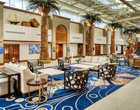 Lobby seating at Island Grand At TradeWinds.