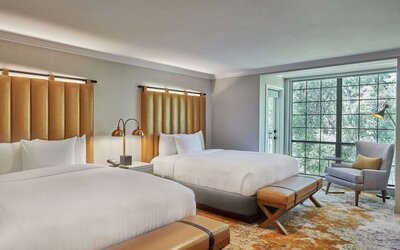 Two beds at The Inn At Saratoga, Tapestry Collection By Hilton.
