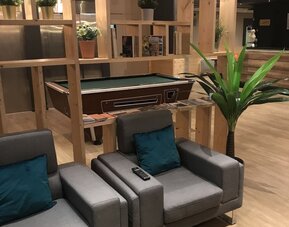 Lounge area at EUROHOTEL Airport Orly Rungis.