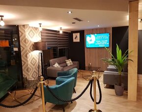 Lobby area at EUROHOTEL Airport Orly Rungis.