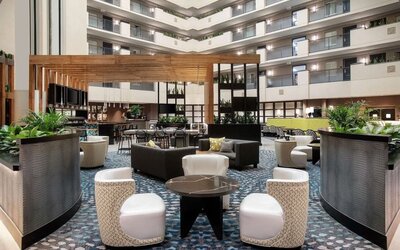Lobby seating at Embassy Suites By Hilton Orlando Airport.